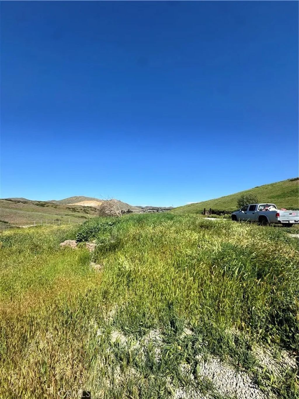 Photo of 0 Vacant Land, Lake Elsinore, CA 92530 (MLS # CV26046938)