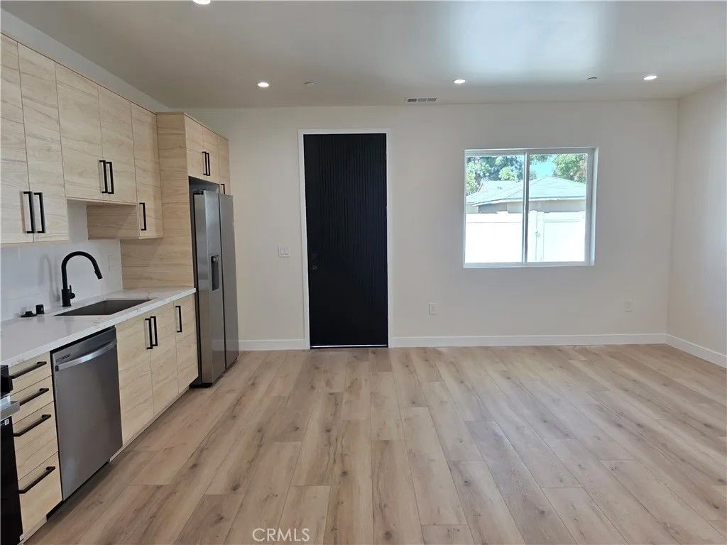 Photo of 17101 Kingsbury St, Granada Hills, CA 91344 (MLS # SR26079597)