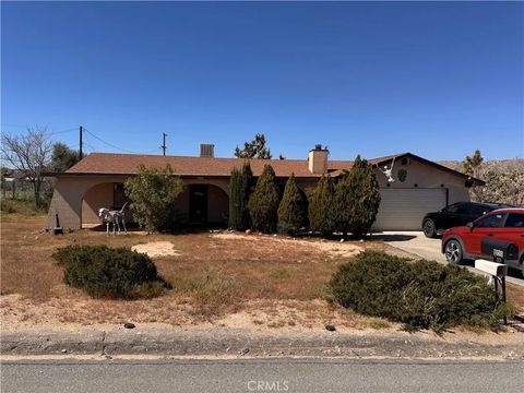 Photo of 7608 Bannock Trl, Yucca Valley, CA 92284 (MLS # IV26053666)