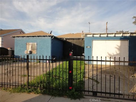 Photo of 213 N Broadacres Avenue, Compton, CA 90220 (MLS # IN26015936)