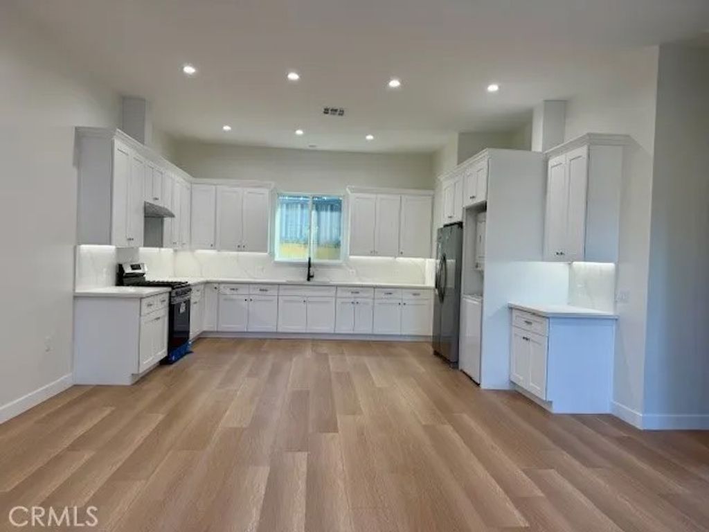 Photo of 8638 Aqueduct, North Hills, CA 91343 (MLS # SR25273499)
