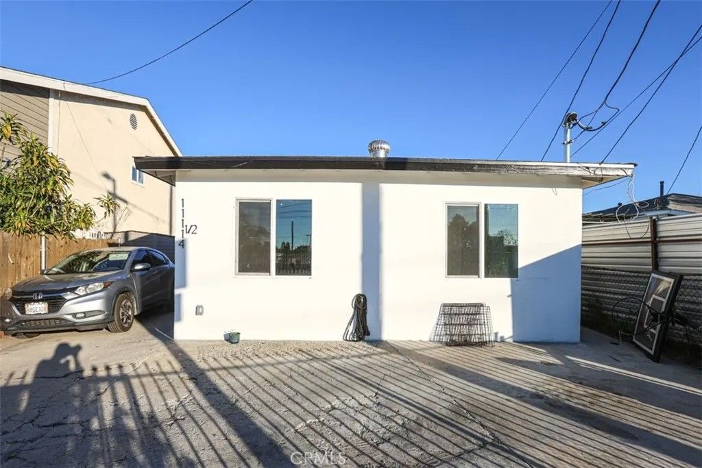 Photo of 11114 Willowbrook Avenue, Los Angeles, CA 90059 (MLS # OC26014038)