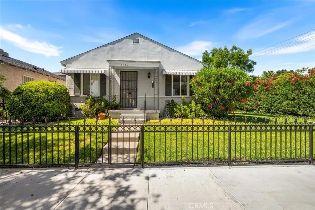 Photo of 5139 E Carson Street, Long Beach, CA 90808 (MLS # OC26131199)