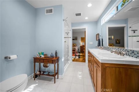 Photo of 1245 S Hudson Ave, Los Angeles, CA 90019 (MLS # SR25239510)