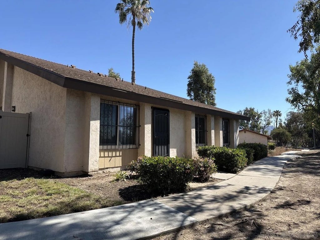 Photo of 8119 Paradise Valley Ct, Spring Valley, CA 91977 (MLS # 260025420)