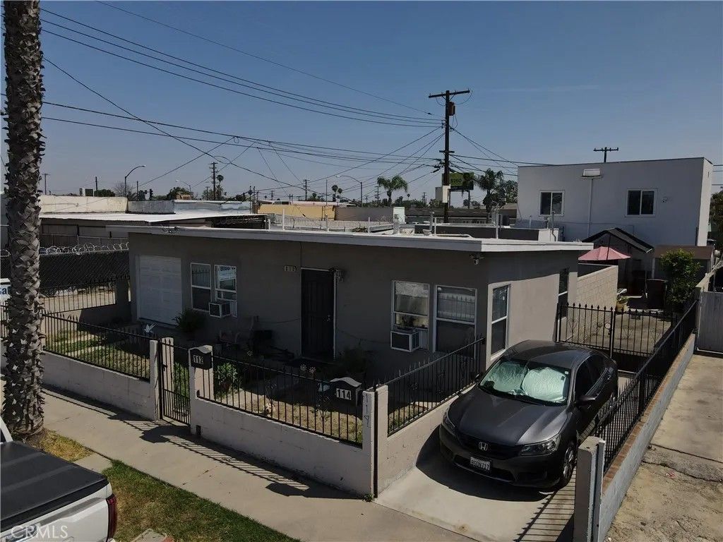 Photo of 114 S Thorson Ave, Compton, CA 90221 (MLS # SB26077982)