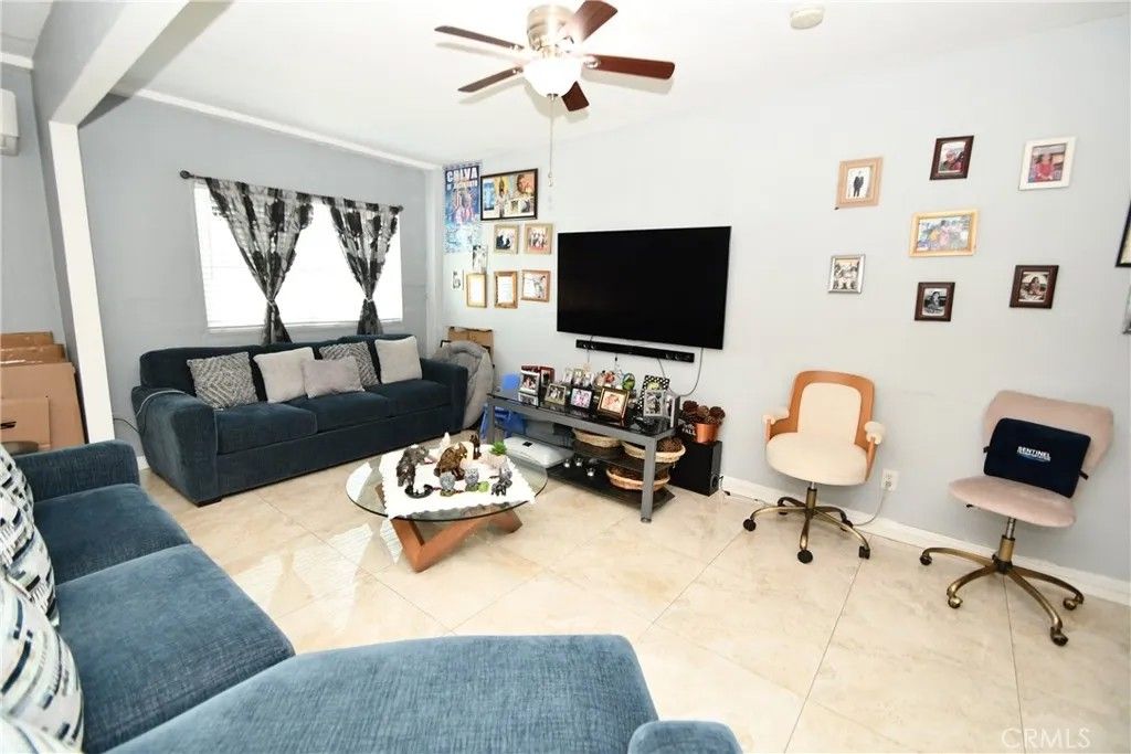 Photo of 114 S Thorson Ave, Compton, CA 90221 (MLS # SB26077982)