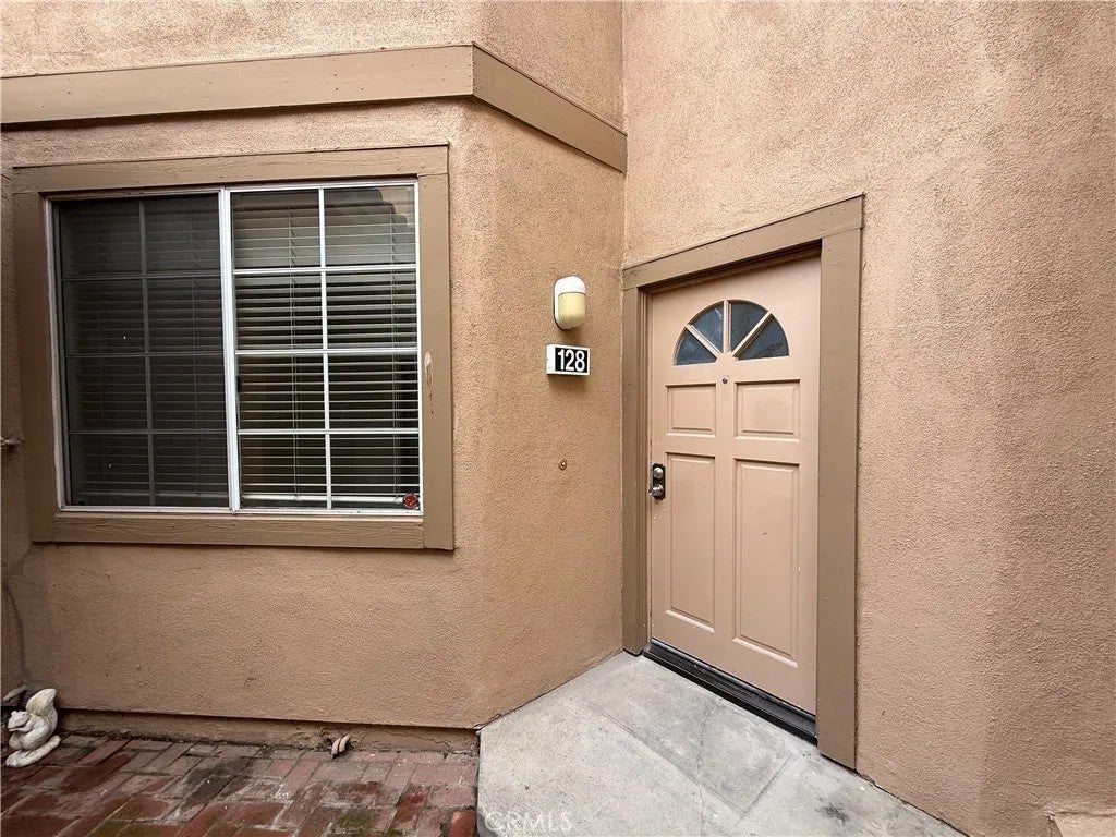 Photo of 128 Cartier Aisle, Irvine, CA 92620 (MLS # WS26197060)