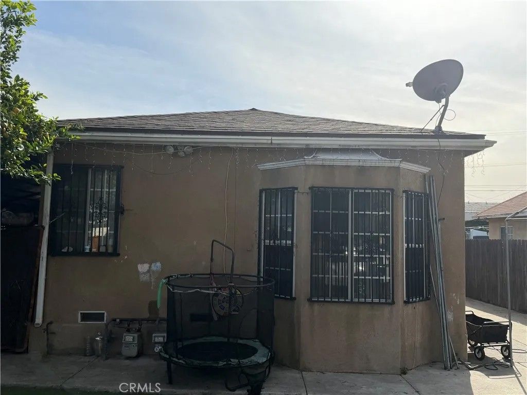Photo of 1462 E 57th St, Los Angeles, CA 90011 (MLS # DW26033965)