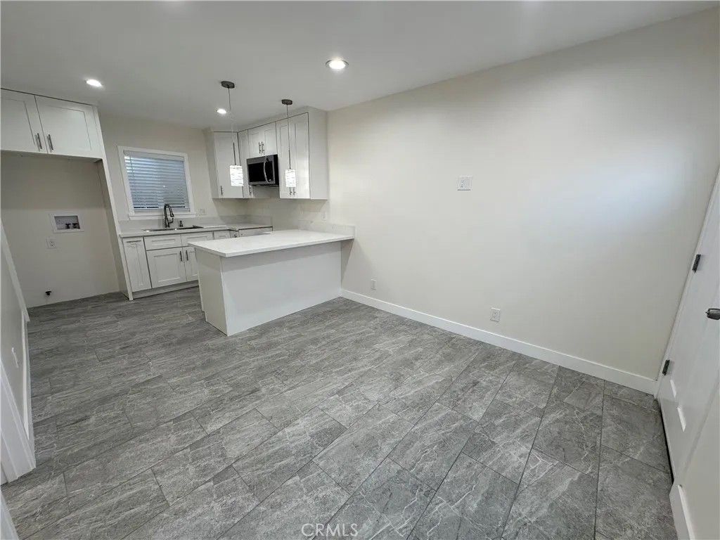 Photo of 12054 Lowemont St, Norwalk, CA 90650 (MLS # DW26072397)