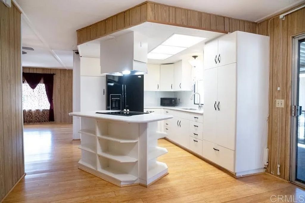 Photo of 8712 N Magnolia Ave #218, Santee, CA 92071 (MLS # PTP2601873)