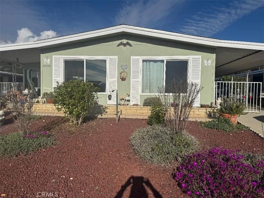 Photo of 41004 Cheyenne Trail, Cherry Valley, CA 92223 (MLS # TR26031702)