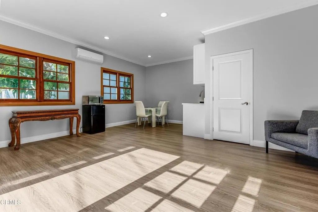 Photo of 1115 S Wilton Place #A, Los Angeles, CA 90019 (MLS # P1-25070)