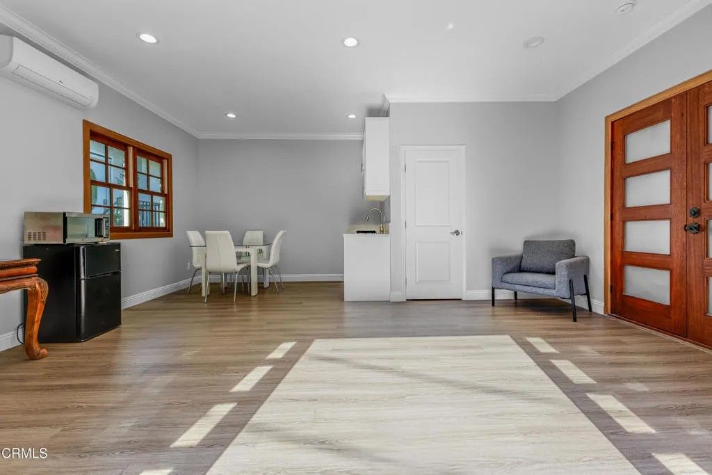 Photo of 1115 S Wilton Place #A, Los Angeles, CA 90019 (MLS # P1-25070)