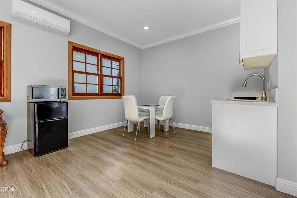 Photo of 1115 S Wilton Place #A, Los Angeles, CA 90019 (MLS # P1-25070)