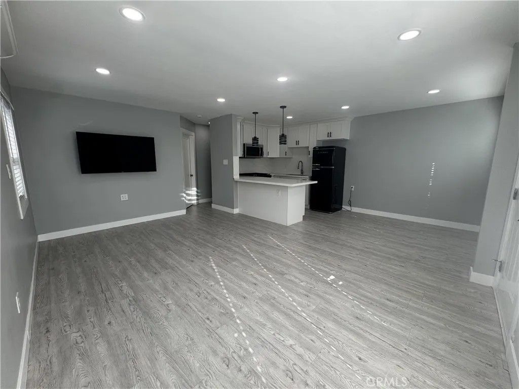 Photo of 5011 E 60th Street #B, Maywood, CA 90270 (MLS # DW26023111)