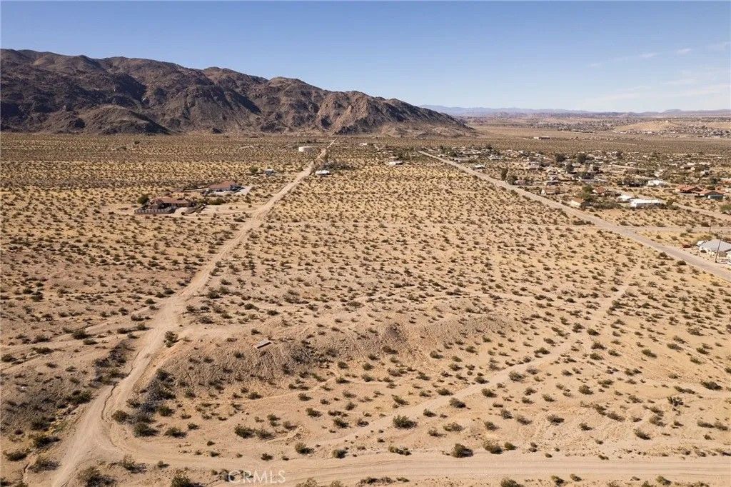 Photo of 7822 Sahara Ave, 29 Palms, CA 92277 (MLS # SW26009794)