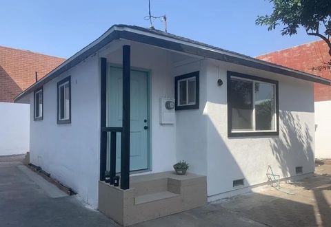 Photo of 1554 E 24th St, Los Angeles, CA 90011 (MLS # DW26004065)