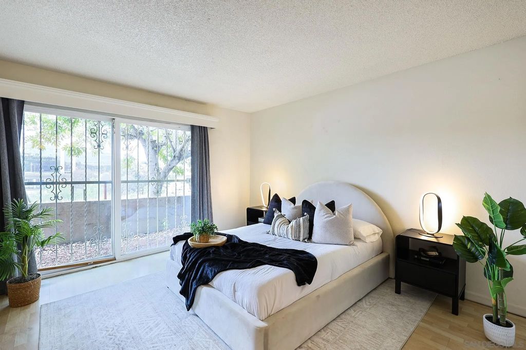 Photo of 7700 Parkway Dr #Unit 2, La Mesa, CA 91942 (MLS # 260010207)
