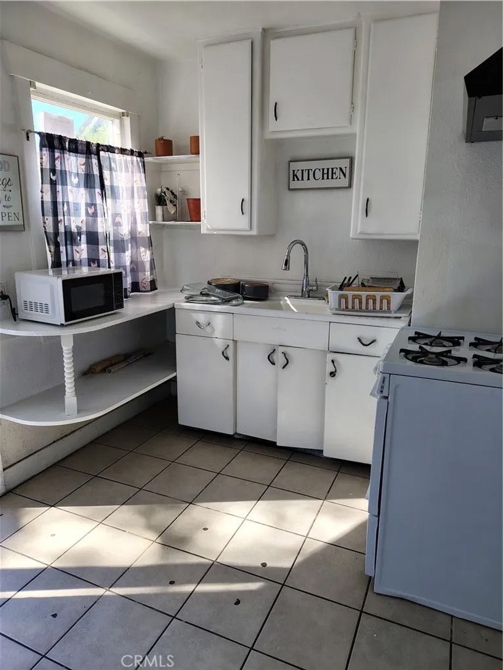 Photo of 120 W Marshall Boulevard, San Bernardino, CA 92405 (MLS # TR26072680)