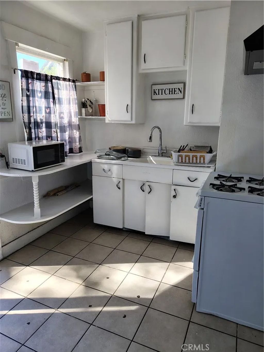 Photo of 120 W Marshall Boulevard, San Bernardino, CA 92405 (MLS # TR26072680)