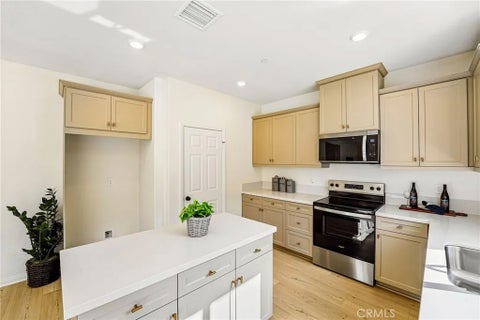 Photo of 884 Porta Marina Lane, Lake Elsinore, CA 92530 (MLS # SW26121904)