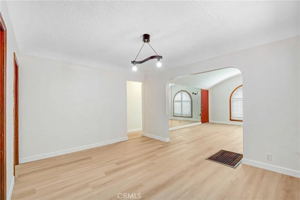 Photo of 7422 Brighton Ave, Los Angeles, CA 90047 (MLS # DW26076154)