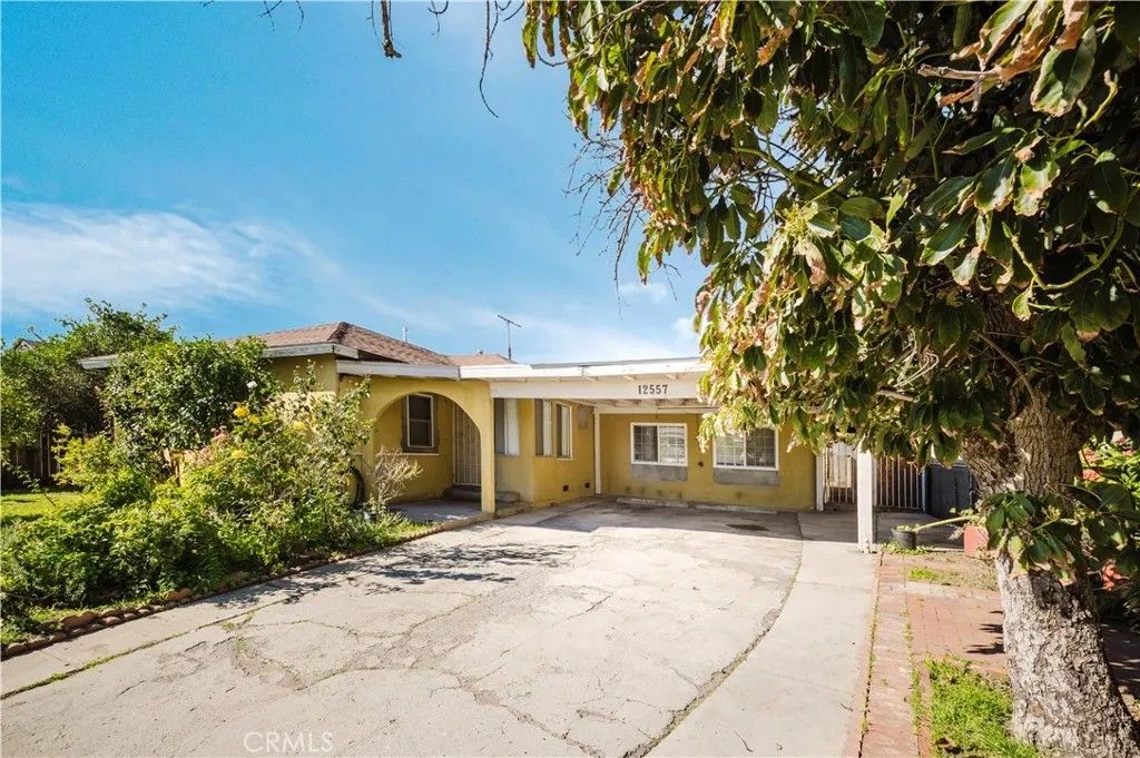 Photo of 12557 Debell Street, Pacoima, CA 91331 (MLS # CV26014879)