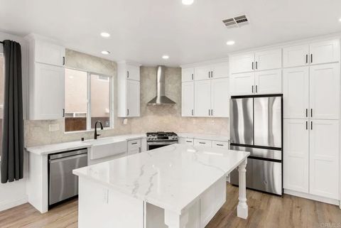 Photo of 1048 Sunset Crossing Point, San Diego, CA 92154 (MLS # PTP2509122)