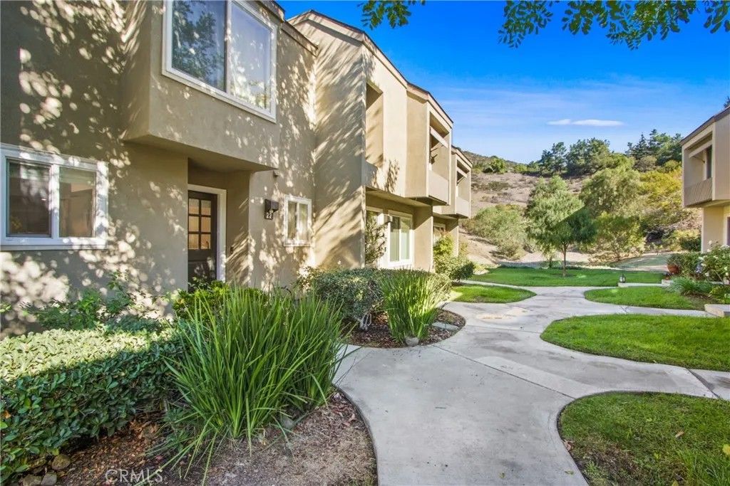 Photo of 307 N Singingwood St #22, Orange, CA 92869 (MLS # OC25250949)