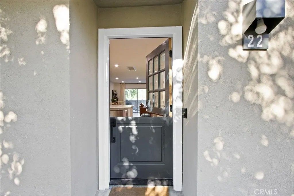 Photo of 307 N Singingwood St #22, Orange, CA 92869 (MLS # OC25250949)