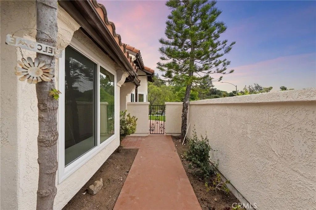 Photo of 1723 Larkhaven Glen, Escondido, CA 92026 (MLS # SW26071022)