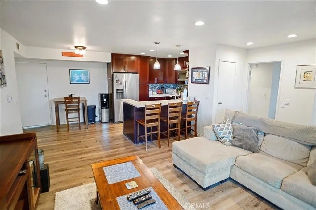 Photo of 24439 Leonard Tree Ln #102, Newhall, CA 91321 (MLS # SR25281785)