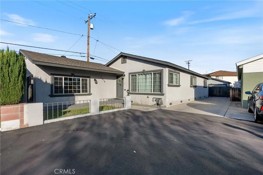 Photo of 11816 La Reina, Downey, CA 90241 (MLS # DW25247497)