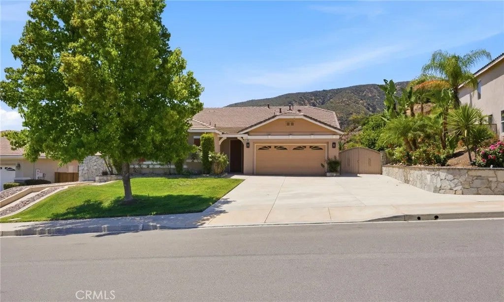 Photo of 13647 Silver Stirrup Dr, Corona, CA 92883 (MLS # SW26126037)