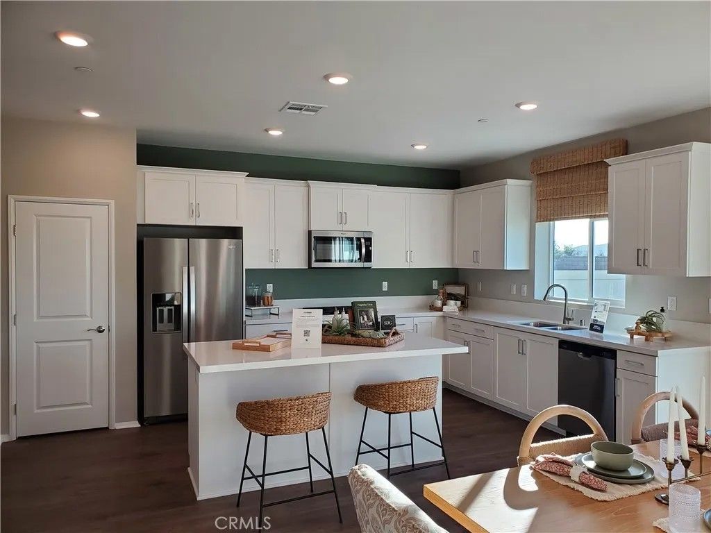 Photo of 31168 Peach Leaf Drive, Winchester, CA 92596 (MLS # SW26008850)