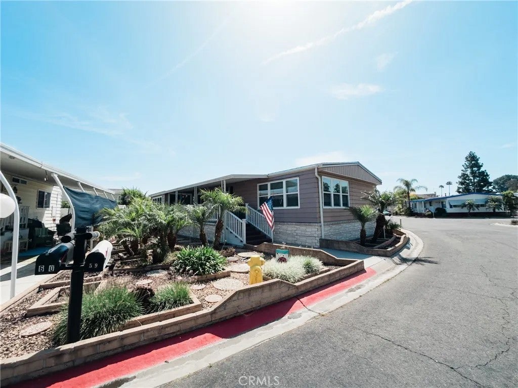 Photo of 18601 Newland St #59, Huntington Beach, CA 92646 (MLS # PW26207124)