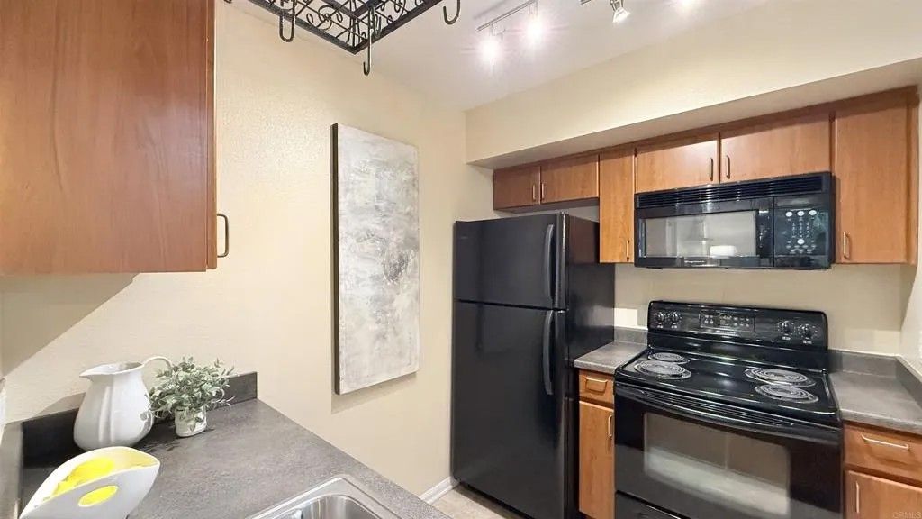 Photo of 1435 India St #409, San Diego, CA 92101 (MLS # PTP2601901)