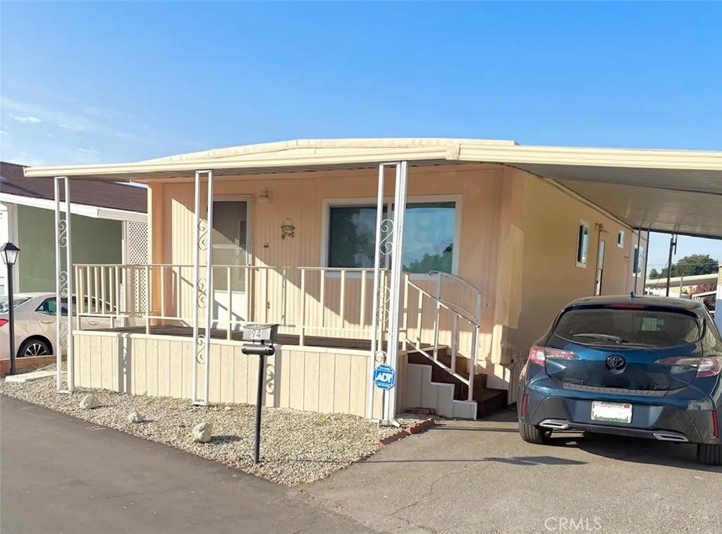 Photo of 301 E Foothill Blvd #94, Pomona, CA 91767 (MLS # CV26028980)