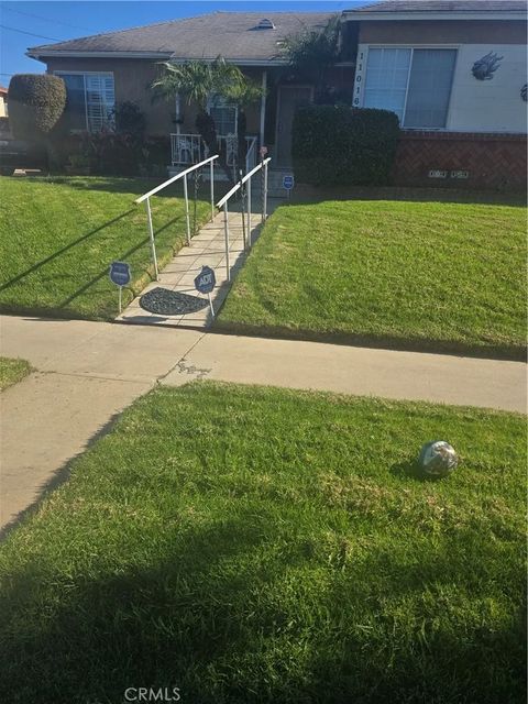 Photo of 11016 S, van Ness Ave, Los Angeles, CA 90047 (MLS # SB26013050)
