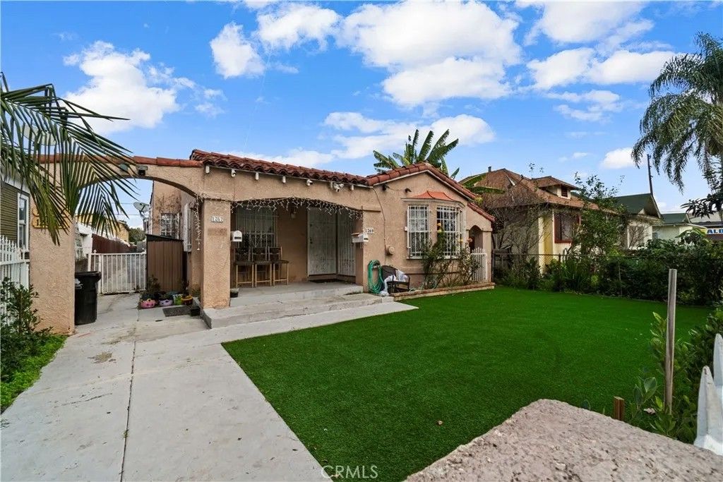 Photo of 1267 E 56th Street, Los Angeles, CA 90011 (MLS # SB25269968)