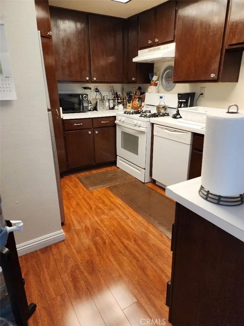 Photo of 15116 S RAYMOND Avenue #104, Gardena, CA 90247 (MLS # SB25279475)