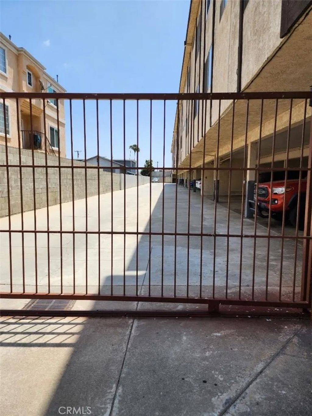 Photo of 15116 S RAYMOND Avenue #104, Gardena, CA 90247 (MLS # SB25279475)