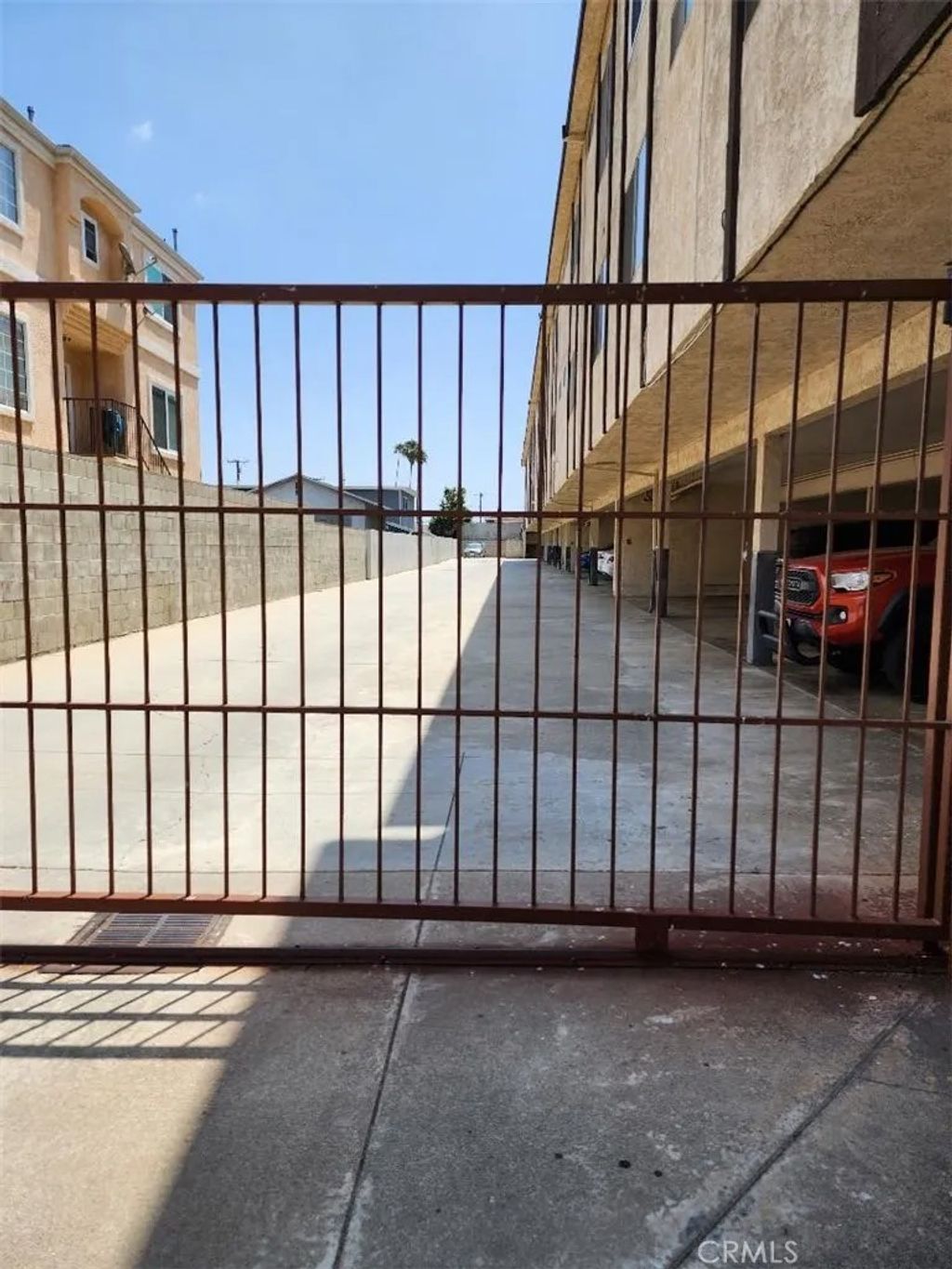 Photo of 15116 S RAYMOND Avenue #104, Gardena, CA 90247 (MLS # SB25279475)