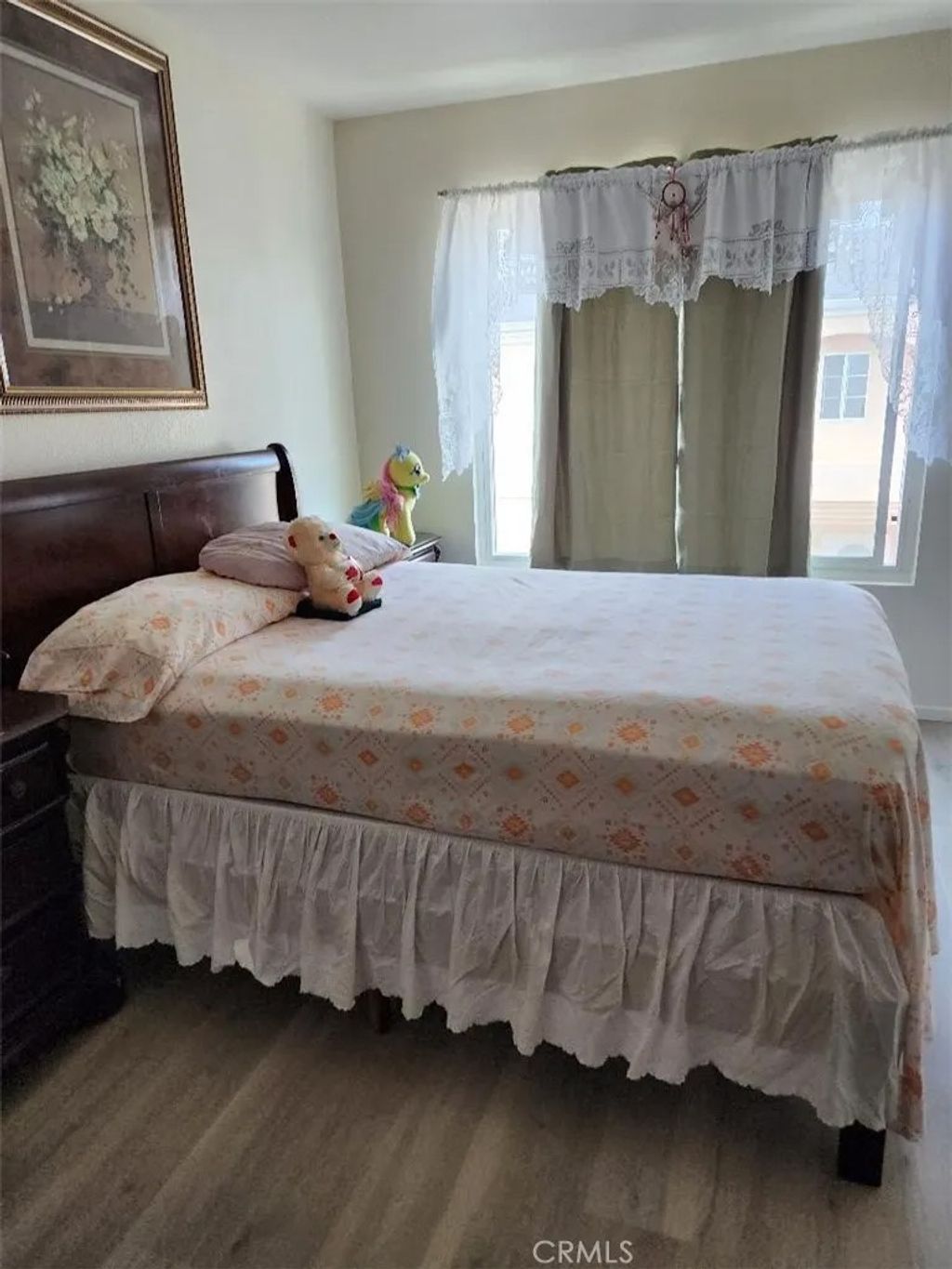 Photo of 15116 S RAYMOND Avenue #104, Gardena, CA 90247 (MLS # SB25279475)