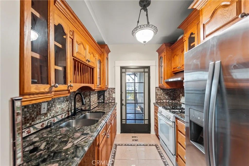 Photo of 1065 Laguna, Los Angeles, CA 90026 (MLS # OC26017363)