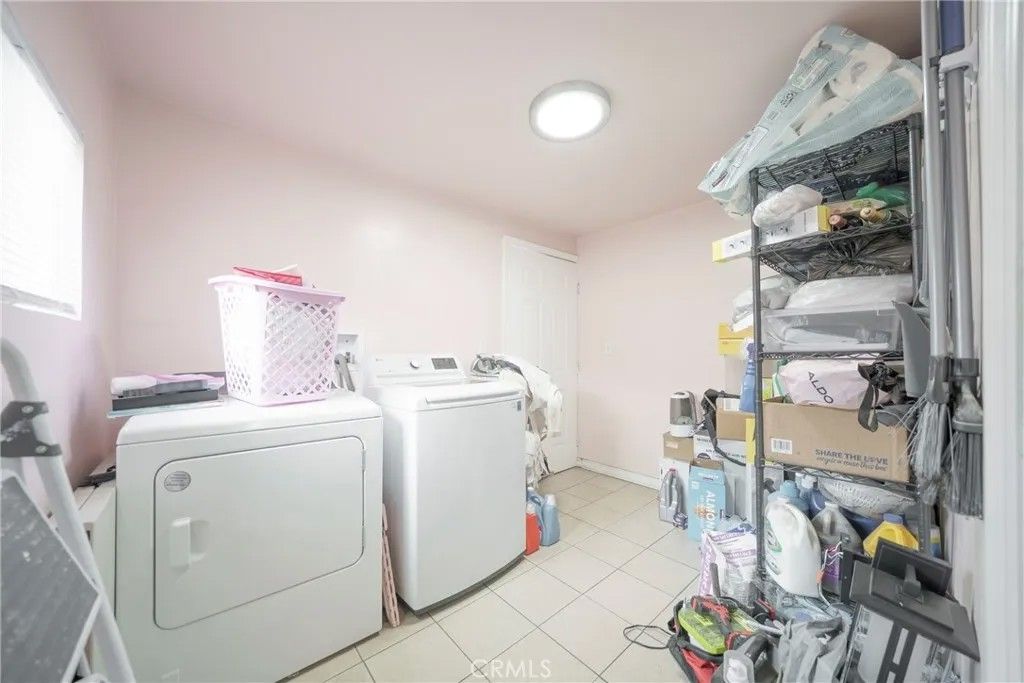 Photo of 1522 W 58th Pl, Los Angeles, CA 90047 (MLS # PW25242786)
