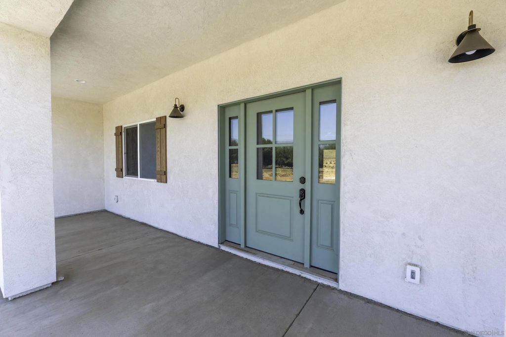 Photo of 14443 Cool Valley Rd, Valley Center, CA 92082 (MLS # 250046152)