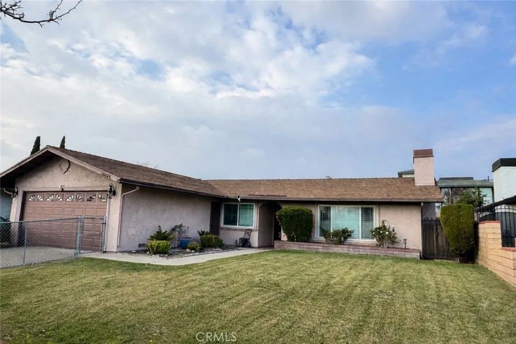 Photo of 16034 Hawthorne Ave, Fontana, CA 92335 (MLS # CV26021883)