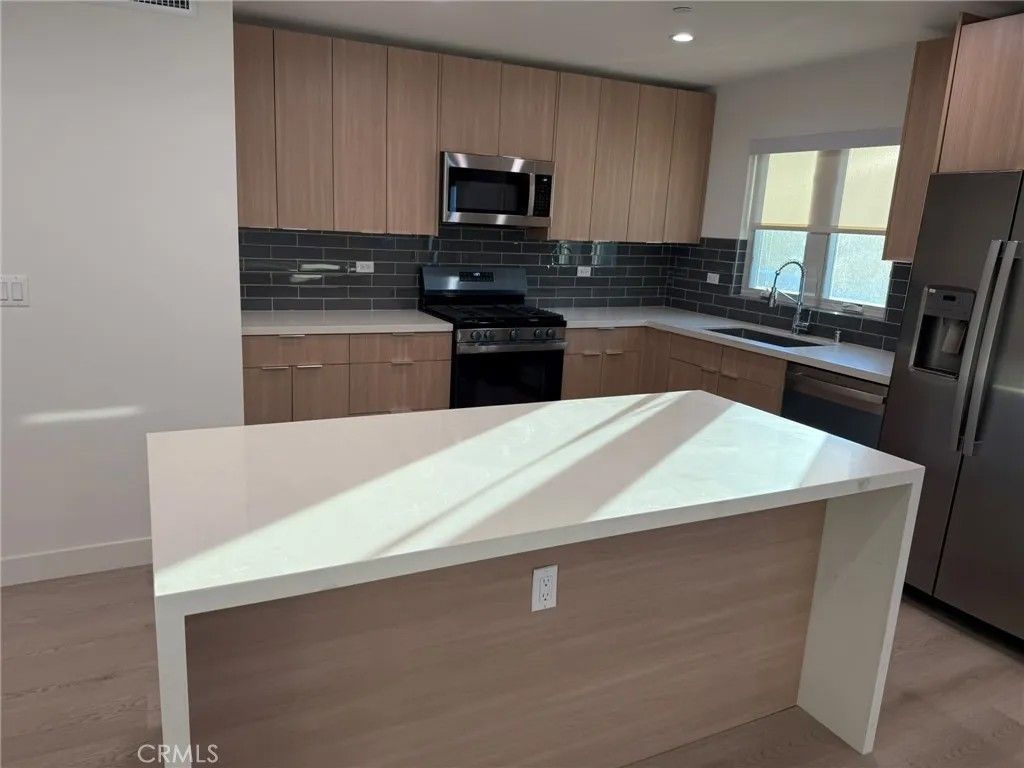 Photo of 5972 Jamieson Ave, Encino, CA 91316 (MLS # SR25276796)